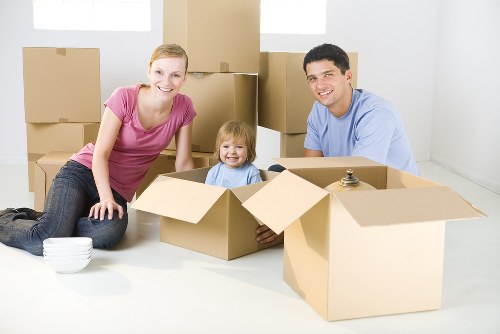 Professional packing team working carefully in a Brompton home
