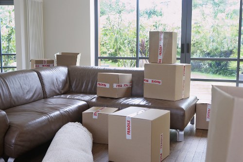 Moving boxes through a Brompton property with narrow access