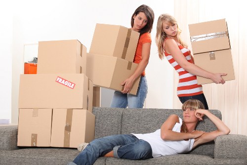 Moving boxes and furniture during a Brompton flat removal service